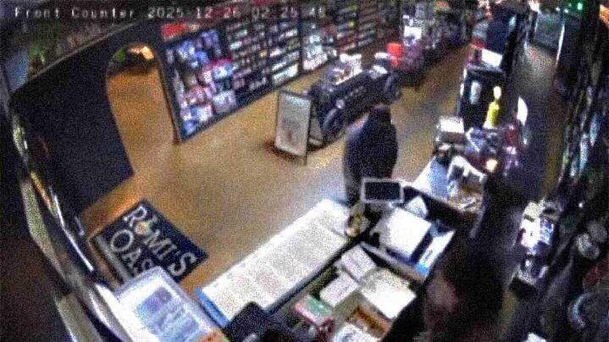 Two masked men are seen inside Rumi’s Oasis in Elk Grove, Calif., during a burglary Thursday, Dec. 25, 2025. The Afghan American-owned bakery, cafe and halal market lost more than $50,000 in cash, equipment and inventory, according to the owner.