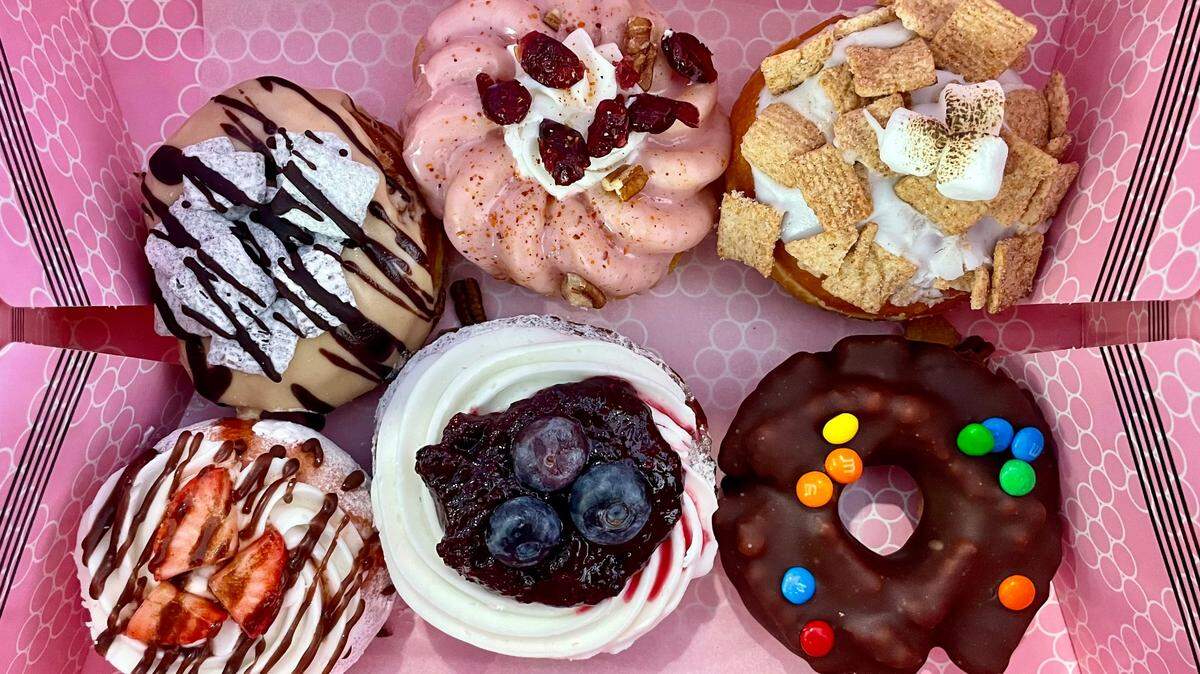 BAD Bakers’ doughnuts bear topping such as Cinnamon Toast Crunch, berry compote and mini M&Ms.