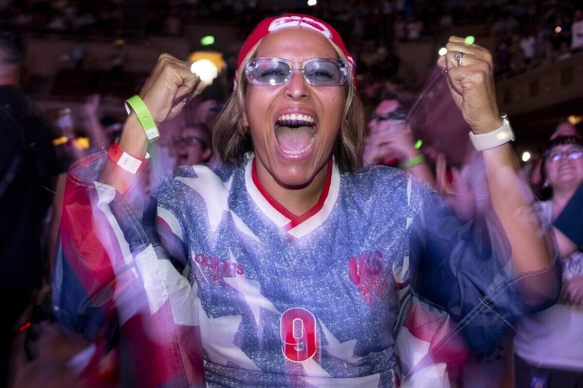 Victoria Belasco cheers during a watch party at Memorial Auditorium in Sacramento on Wednesday as she watches the U.S. men's soccer team face off against Bosnia and Herzegovina in the World Cup. The game, which the U.S. won 2-0, was played in Santa Clara.