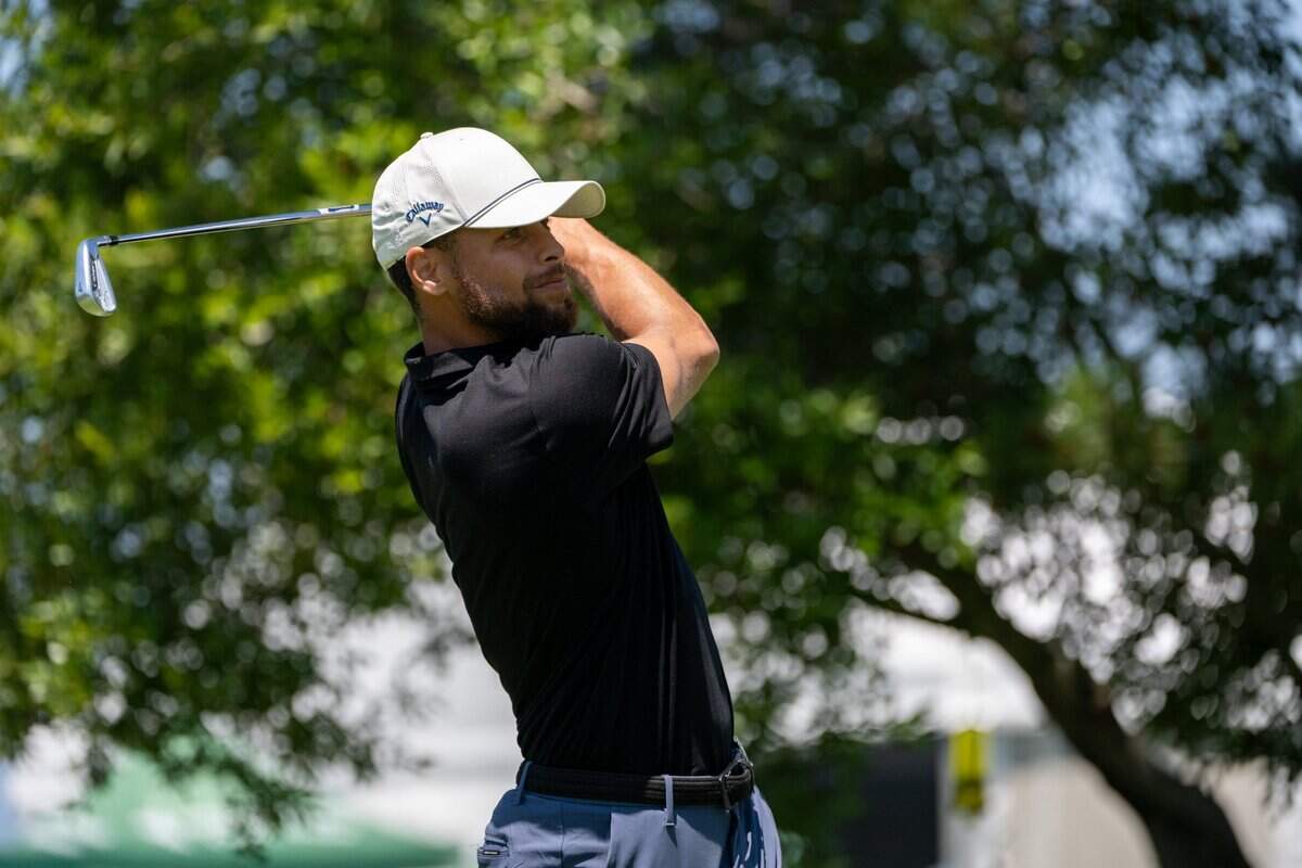 The Golden State Warriors’ Stephen Curry drives off the 10th hole tee during the American Century Championship celebrity golf tournament at Edgewood Tahoe Resort in Stateline, Nev., on Friday, July 11, 2025.