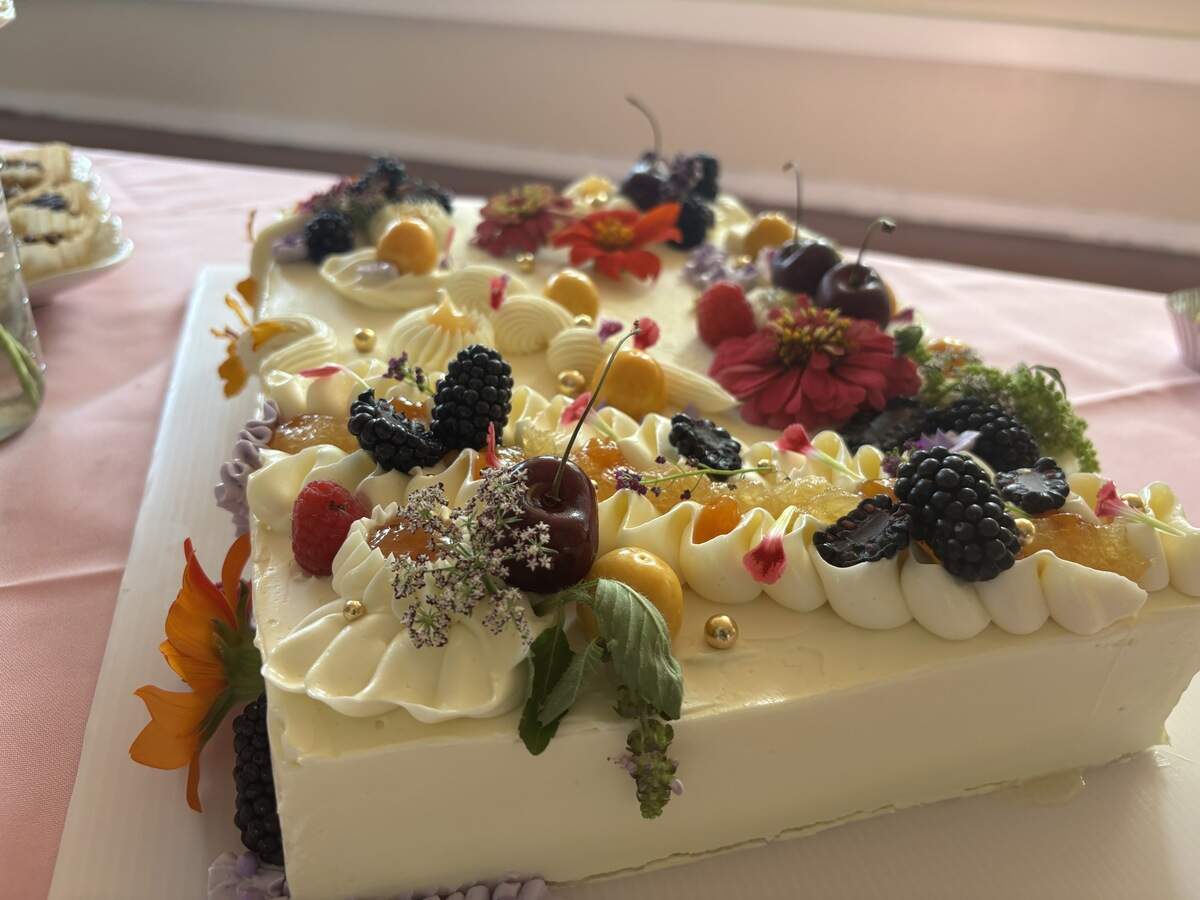 Vy Nguyen, owner of SugarBean Cake Shop and co-founder of Micro but Mighty Bakers, made a coconut mango cake for Sugar Social dessert picnic on Saturday morning.
