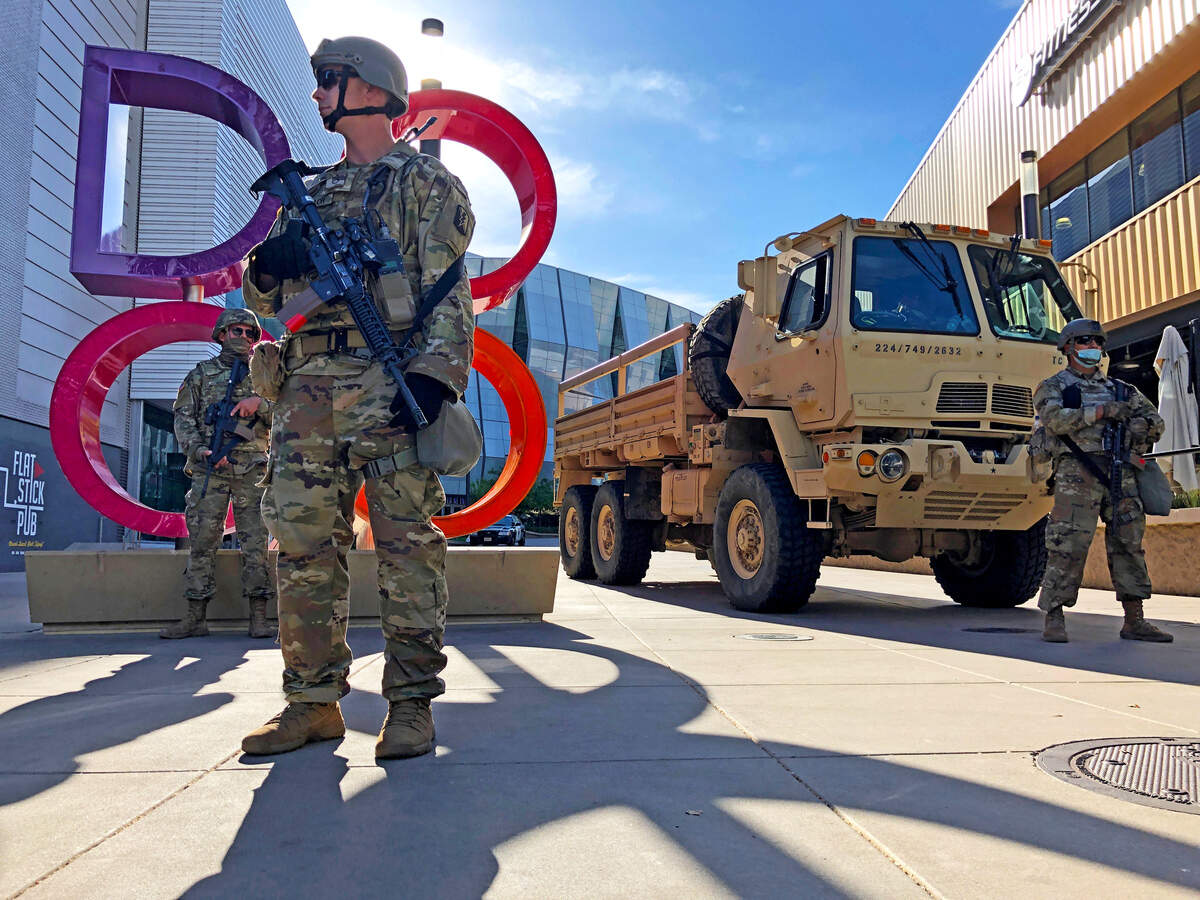 4. Members of the California National Guard, 184th infantry stand guard at Downtown Commons on Monday, June 1, 2020. About 500 guard troops started to arrive in Sacramento after the city and its police department made the request for additional assistance Sunday after two days of vandalism and theft after protests over the death of George Floyd. The city also instated a curfew at 8 p.m.