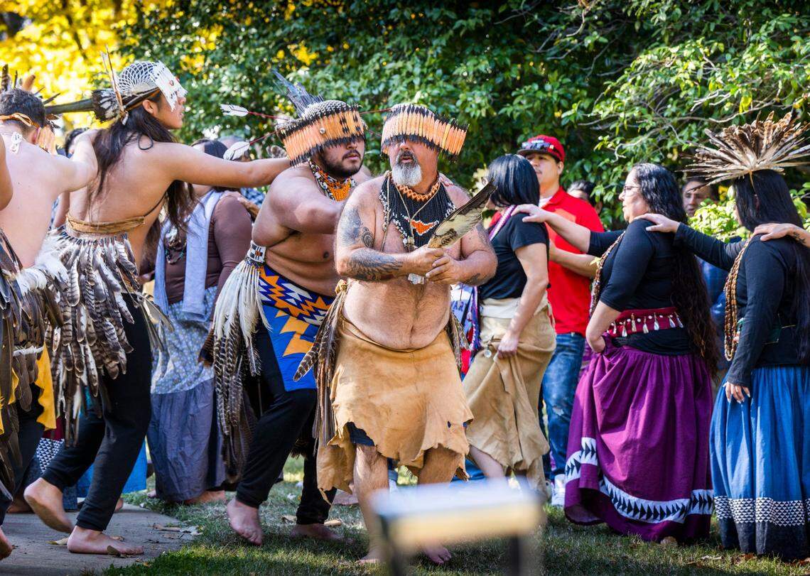 Billy Hamilton of Hayfork, a Wintu tribe member, leads dancers on Monday, Nov. 14, 2022, after Sacramento-area tribal leaders joined Assemblyman James Ramos for a groundbreaking at Capitol Park for a monument honoring Native Americans. The monument will replace a statue of missionary Junípero Serra that was toppled by protesters in 2020.