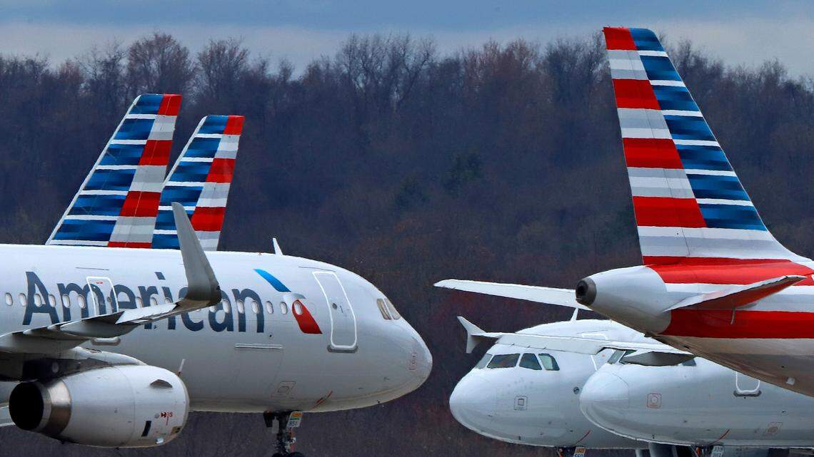 American Airlines planes are parked at Pittsburgh International Airport in Imperial, Pa. , in March. On Sunday, an American Airlines pilot inquired on radio about a strange cylindrical object spotted flying over his airliner in New Mexico, officials say.