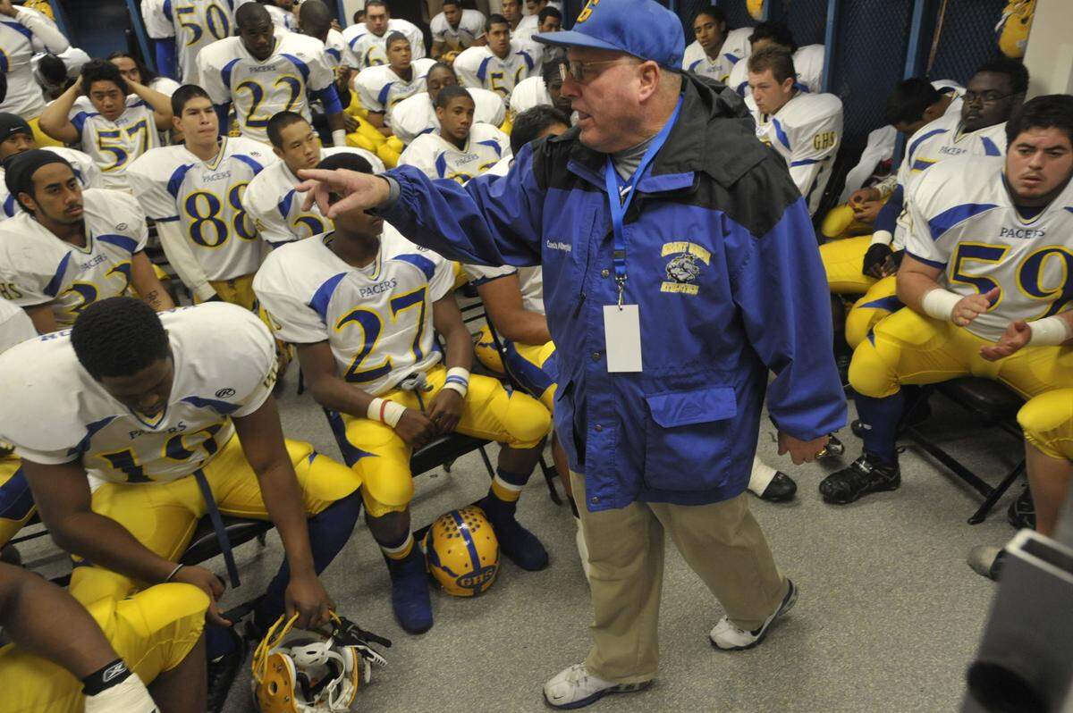 Coach Mike Alberghini prepares the Grant football team for the game against Long Beach Poly in the CIF State Championship Open Division Bowl Game at the Home Depot Center on Saturday, Dec. 20, 2008.