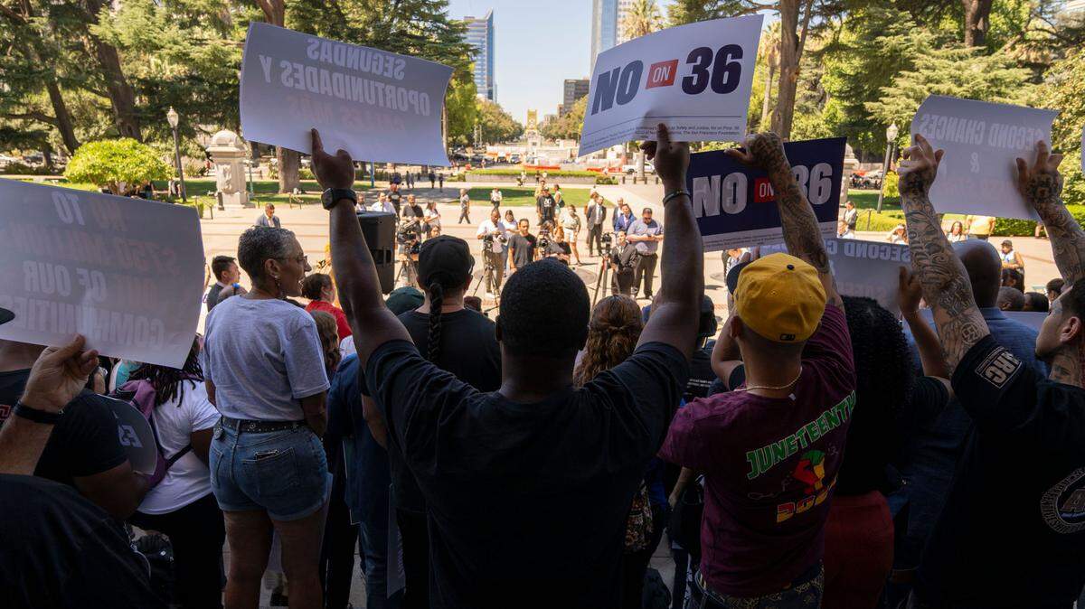 People attend a rally against Proposition 36 at the state Capitol on Monday, Aug. 19, 2024. 