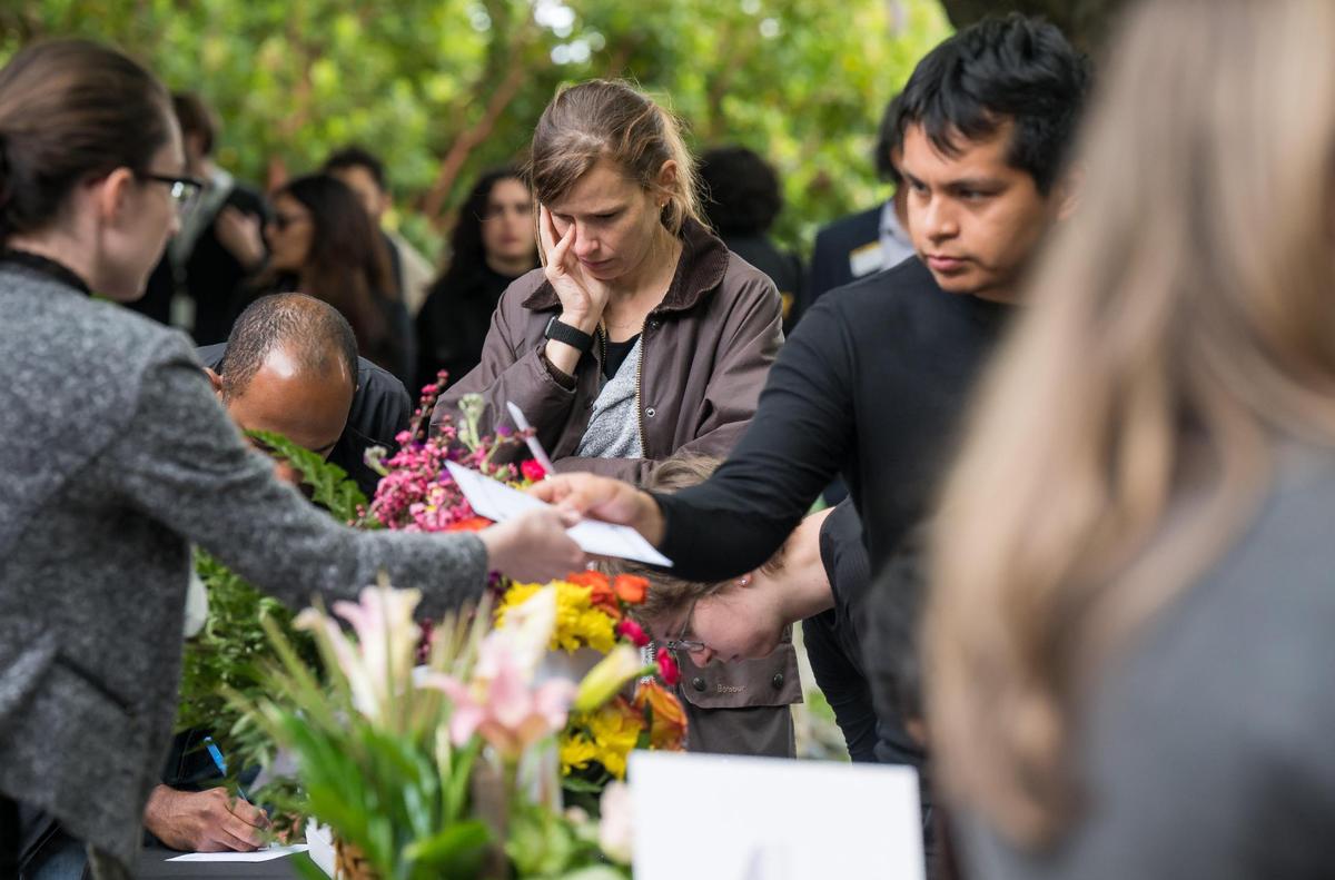 UC Davis students, staff and community members visit a table to write messages for the family before a Celebration of Life for Karim Abou Najm on Friday, May 5, 2023, at the UC Davis International Center on campus. Najm, a UC Davis senior and son of a professor, was fatally stabbed in Sycamore Park in Davis.