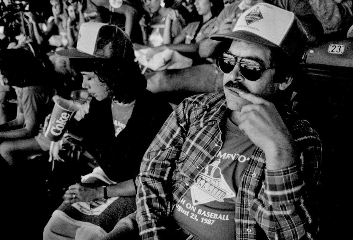 Gregg Lukenbill, the managing general partner of the Sacramento Sports Association, sits in the stands during the "March on Baseball" on Aug. 23, 1987, as the Athletics play the New York Yankees in Oakland.