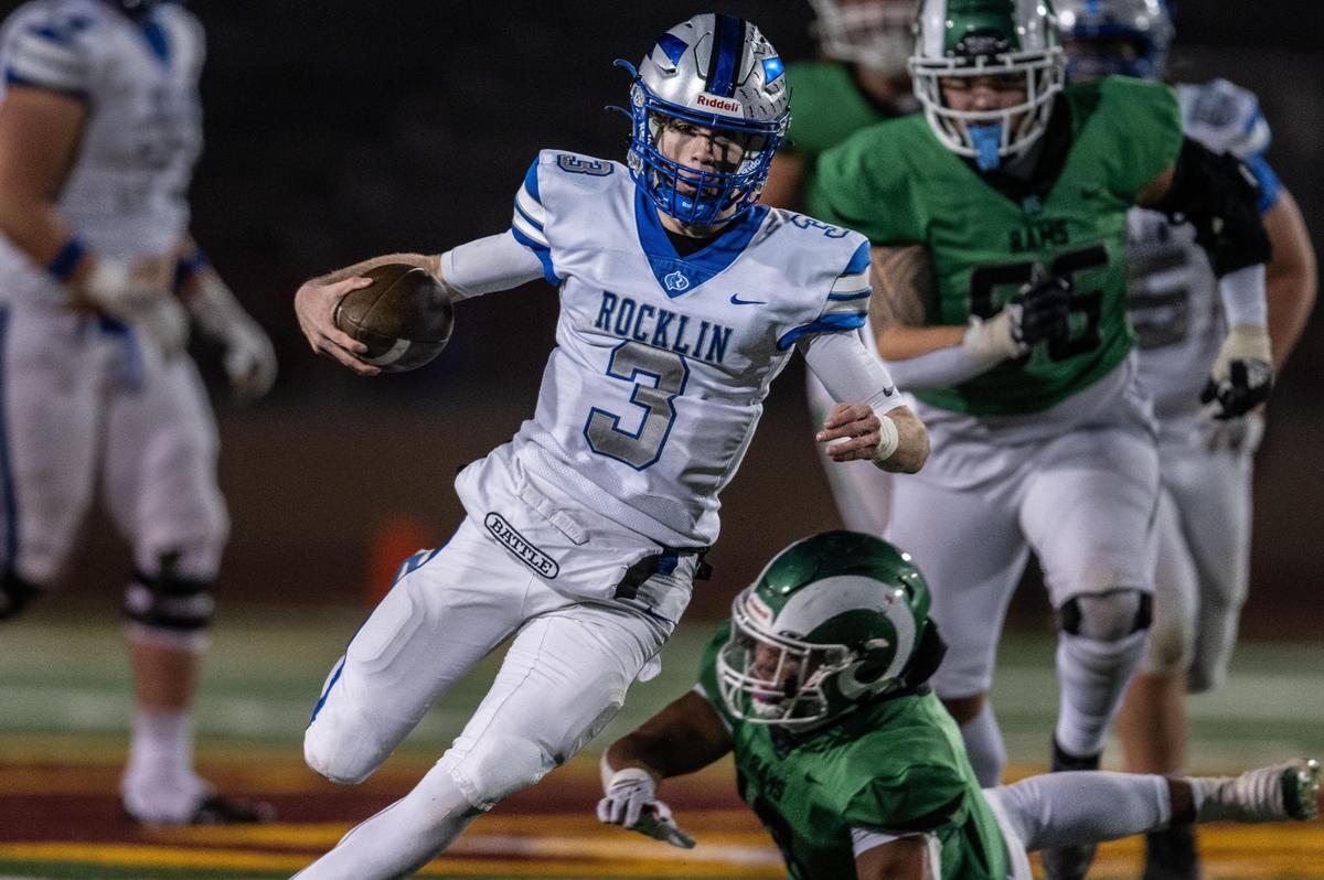 Rocklin Thunder quarterback Reeve Slone (3) eludes the final St. Mary’s Rams defender on his way to a touchdown in the second half of the CIF Sac-Joaquin Section Division II football championship game on Saturday, Nov. 25, 2023, at Hughes Stadium.