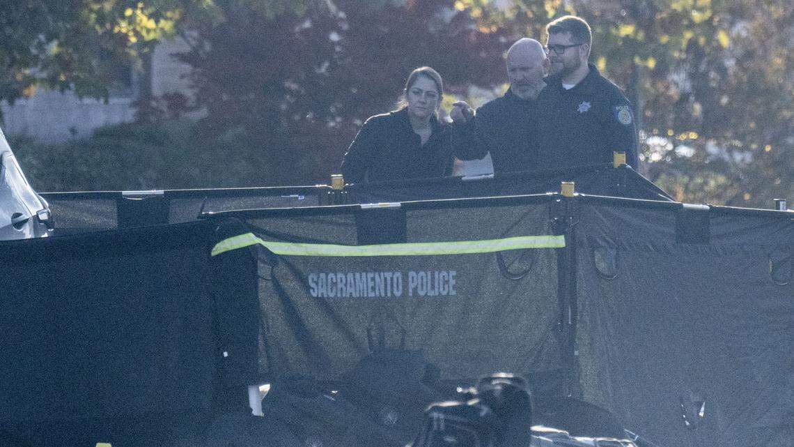 Sacramento police investigate a crime scene where a man was found dead near the intersection of Stockton Boulevard and Broadway in Oak Park on Tuesday.