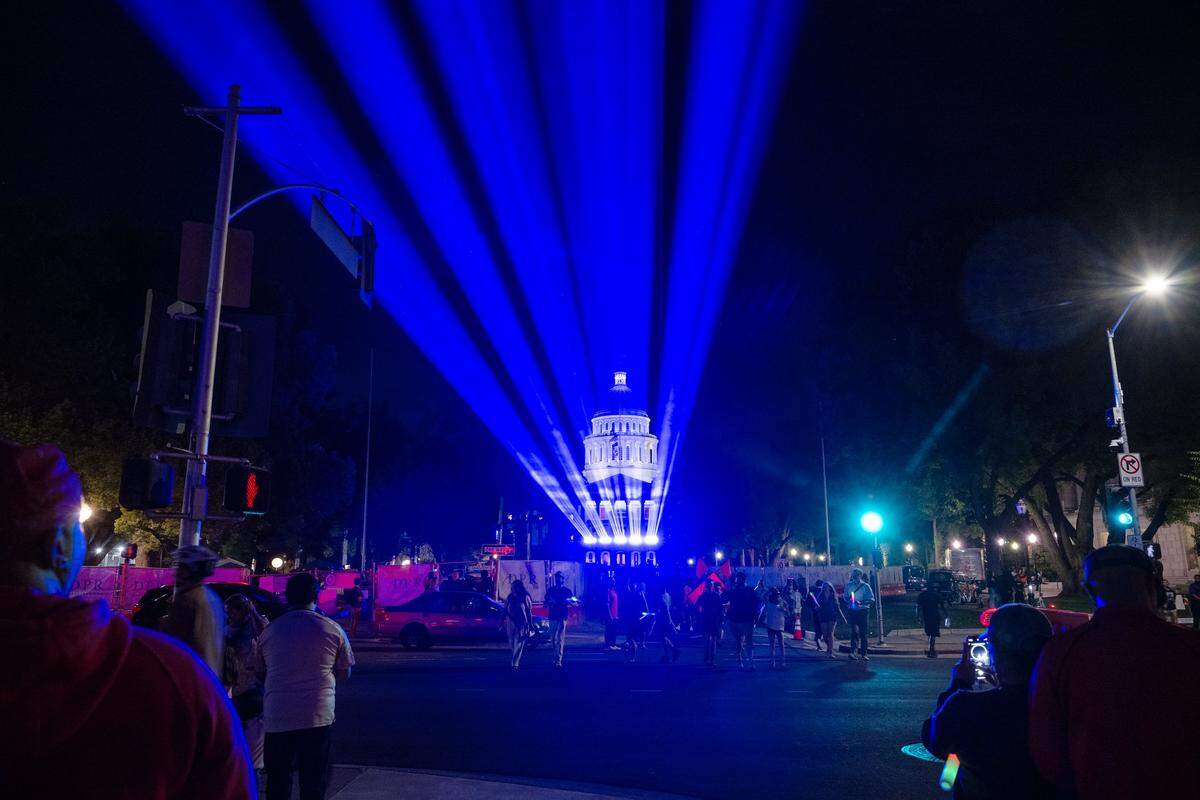 A laser show illuminates the Sacramento sky over the state Capitol during a 175th birthday block party to celebrate California's anniversary of statehood on Tuesday, Sept. 9, 2025, at the state Capitol.