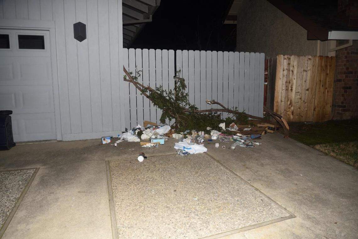 An image from the Sacramento Police Department shows yard waste and debris on the driveway of the home of Sacramento Mayor Darrell Steinberg on Saturday, Feb. 6, 2021, after it was vandalized by activists.