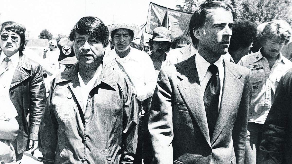 Gov. Edmund Brown Jr., walks in UFW march with Cesar Chavez as hundreds of farm workers follow, Aug. 11, 1979. About 15,000 workers attended a mass rally here as show of union strength as the UFW is in its seventh month of field strike. Brown came down just for the rally & walked about 4 miles before speaking briefly. (AP Photo)