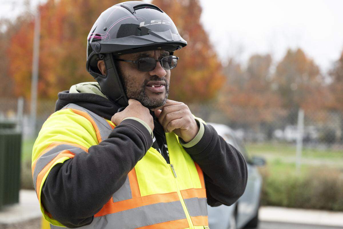 Dewayne McDaniel, 53, prepares to ride his e-bike from his apartment complex in  Sacramento on Thursday.