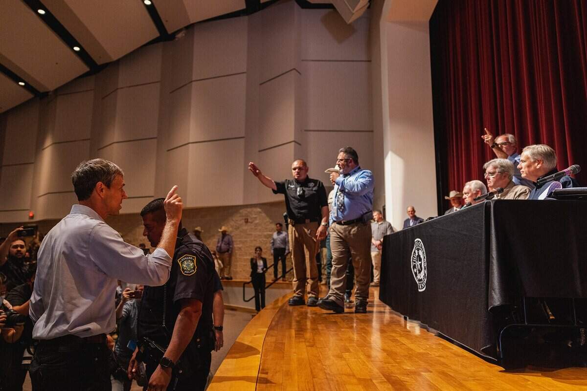 Democratic gubernatorial candidate Beto O’Rourke interrupts a press conference held by Texas Gov. Greg Abbott following a shooting Tuesday at Robb Elementary School that left 21 dead including 19 children, on May 25, 2022, in Uvalde, Texas. The shooter, identified as 18-year-old Salvador Ramos, was reportedly killed by law enforcement. (Jordan Vonderhaar/Getty Images/TNS)