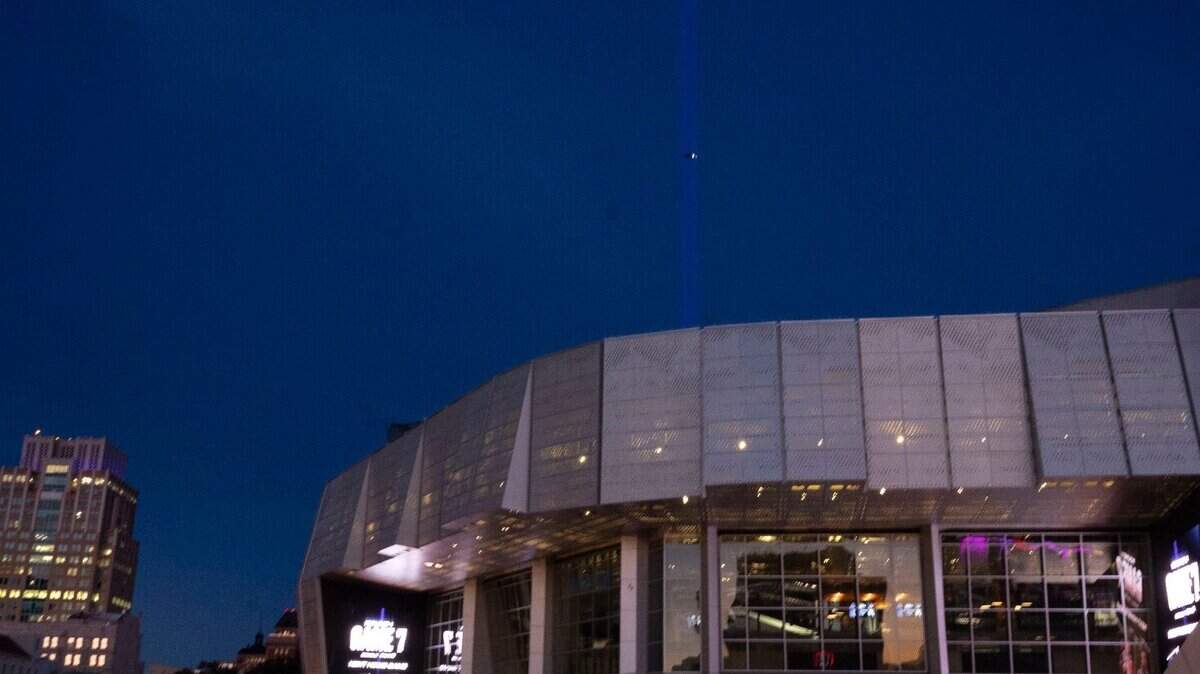 The beam is faintly visible at Golden 1 Center as dusk falls after the Game 6 watch party for the the first-round NBA playoff series between the Sacramento Kings and the Golden State Warriors in San Francisco on Friday, April 28, 2023.