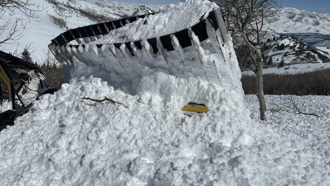 An avalanche buried two people on a snowcat March 28 near Morgan, Utah, rescuers said. Passengers on another snow vehicle raced to dig them out.