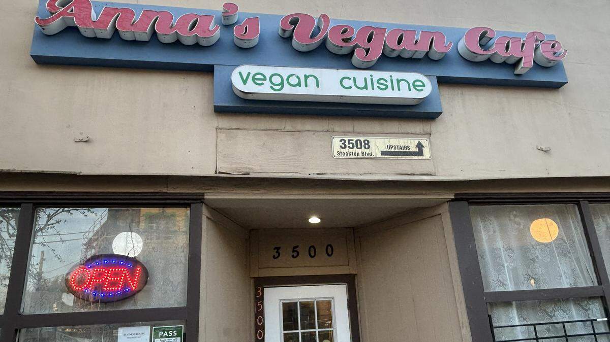 In Sacramento’s Oak Park near the The Colonial Theatre and The Colony live music venue stands a small brown building with a large sign in red saying Anna’s Vegan Cafe.