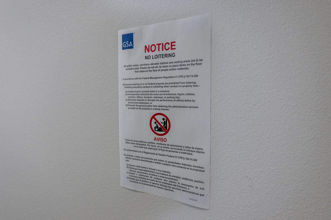 A “NO LOITERING” sign is posted on the fourth floor of the John E. Moss federal building in downtown Sacramento outside immigration court hearings on July 23. Copies of the sign are also posted on the fifth and seventh floor.