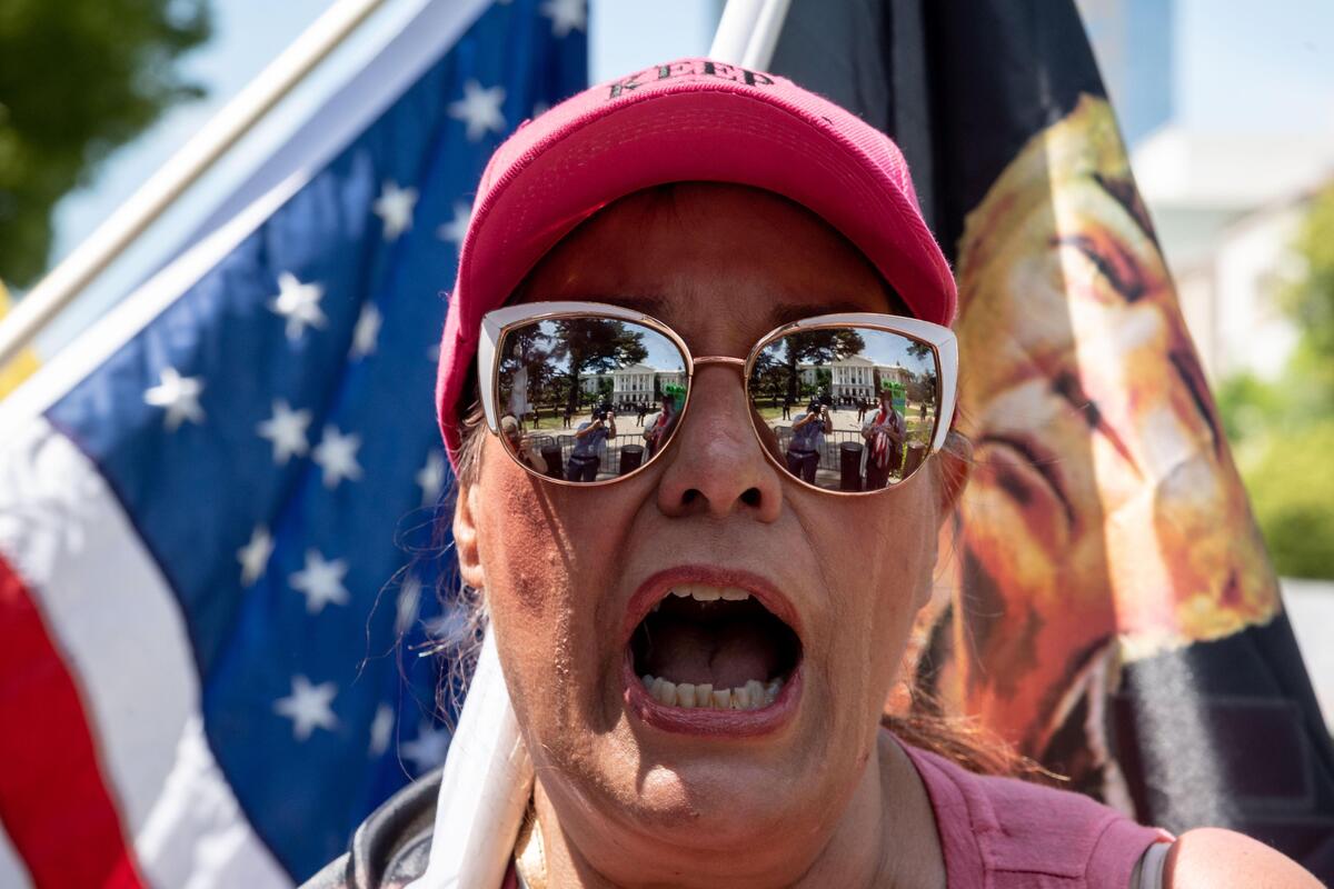 “Don’t you believe in God? Because you better fear the day you got to face your judgment,” exclaimed Paulette McCarthy, of Lodi, while protesting Saturday, May 9, 2020, outside the Capitol.