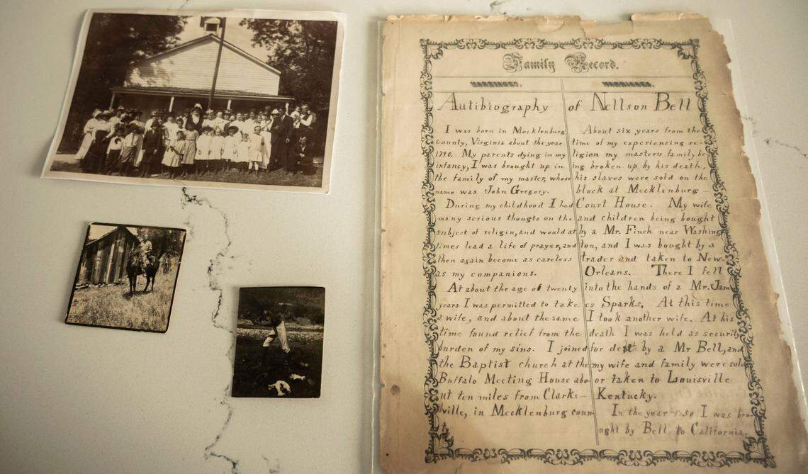 Jonathan Burgess shows old family photos from the gold-rush era and an autobiography written by his great-grandfather Rufus Burgess, known by his slave name as Nellson Bell, that was attached at the end of a family bible. The autobiography became the inspiration for his children’s book “Gold Rush: Burgess Descendants.”