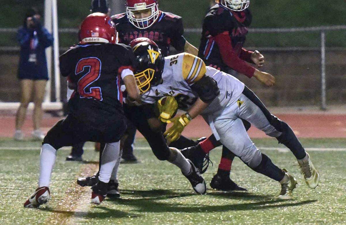 Delta running back Jax Soto (32) scores a touchdown to put the Saints ahead to open the third quarter of a CIF Sac-Joaquin Division VIII semifinal game against Mira Loma on Friday at El Camino High School in Arden Arcade. Mira Loma forged ahead to win the game, 48-34.