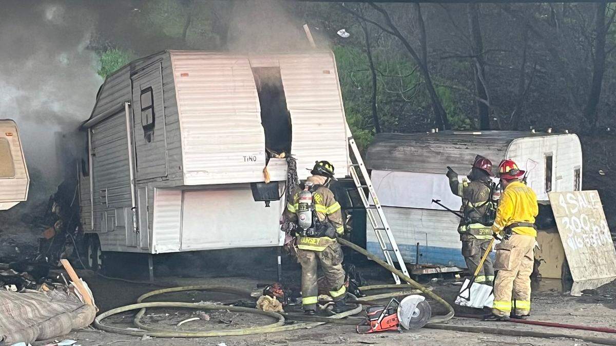 A woman was found dead inside a trailer after a fire at a homeless encampment beneath an Interstate 80 overpass near Roseville Road in Sacramento on Sunday, March 19, 2023.