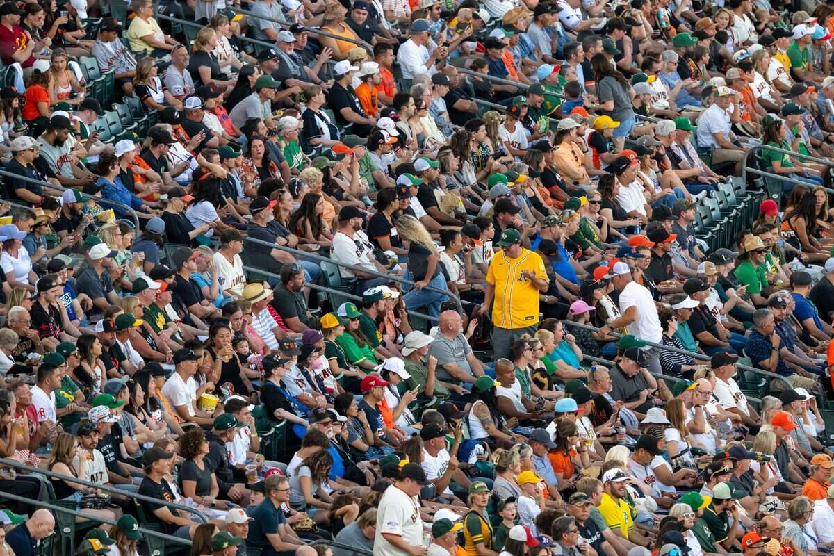 Athletics and San Francisco Giants fans fill the stands during a baseball game at Sutter Health Park in West Sacramento on July 5.
