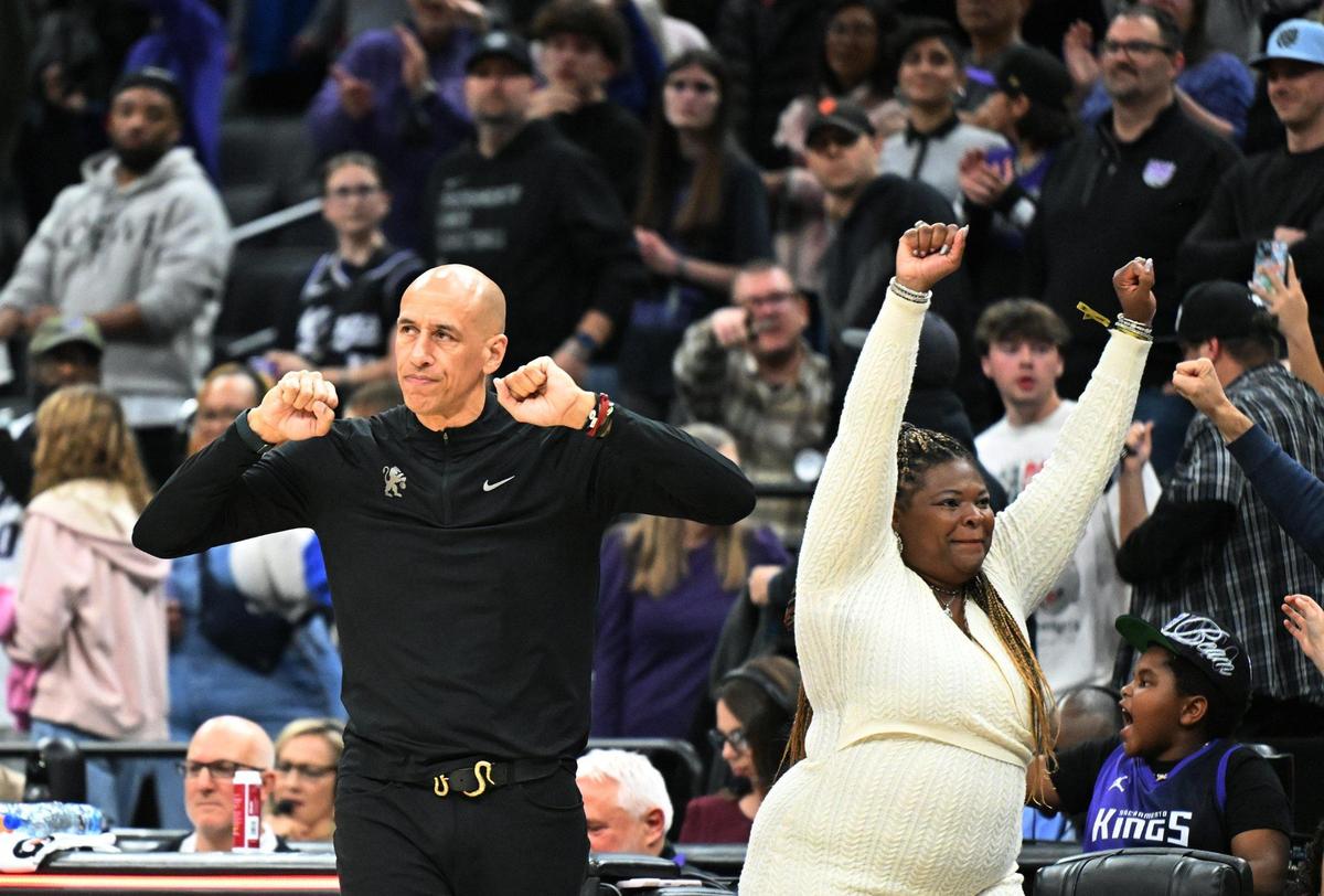 Sacramento Kings interim head coach Doug Christie clenches his fists after the Kings victory over the Philadelphia 76ers on Wednesday, Jan. 1, 2025 at Golden 1 Center.