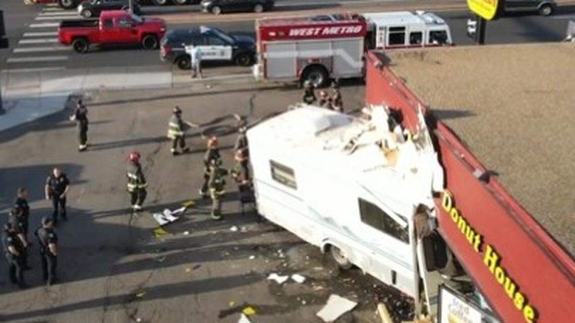 A recreational vehicle slammed into a Winchell’s Donut House in Lakewood, sending a man seated near the window flying, Colorado firefighters say.
