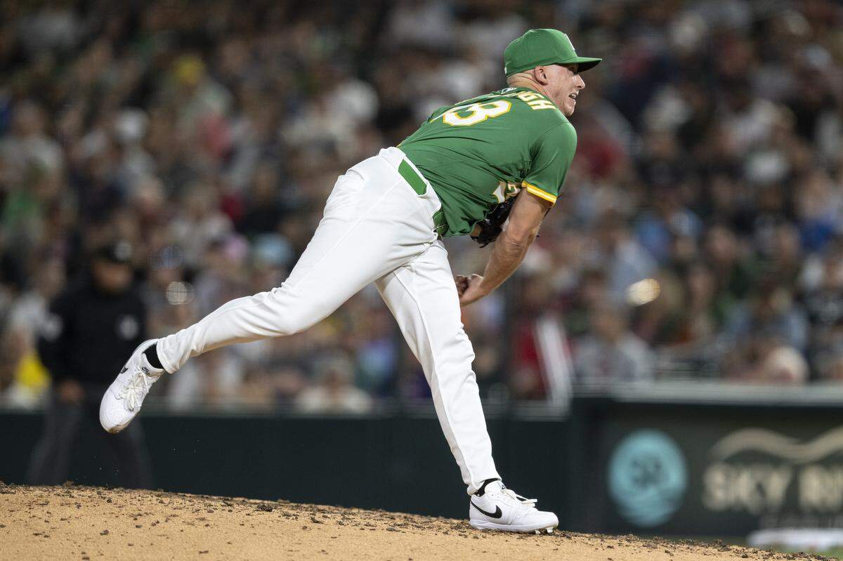 Athletics pitcher Scott McGough (48) throws a pitch during a game between the Athletics and the Red Sox at Sutter Health Park in West Sacramento on Monday, Sept. 8, 2025.