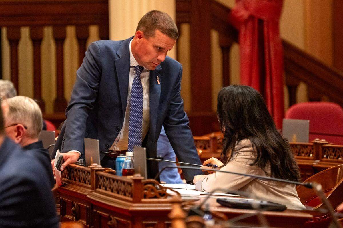 Senate President Pro Tem Mike McGuire, D-Healdsburg, talks with Susan Rubio D-part of Los Angeles and San Bernardino, on July 3 in Sacramento.