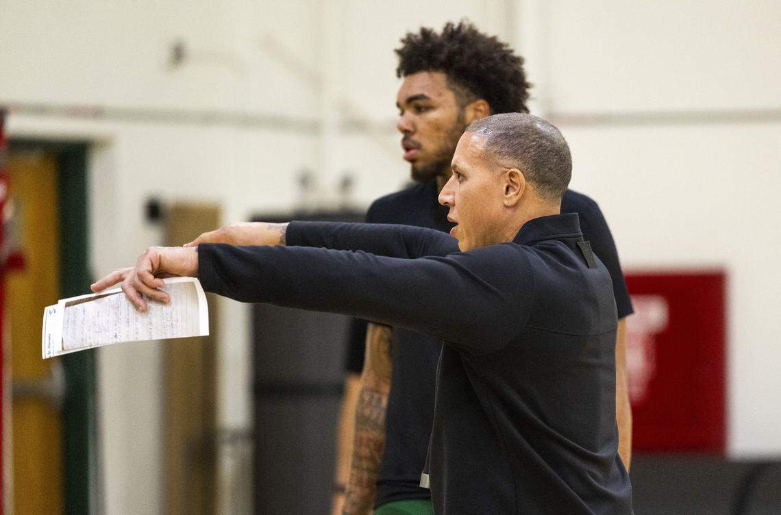 Sacramento State head coach Mike Bibby talks with forward Jeremiah Cherry during practice on Oct. 24.
