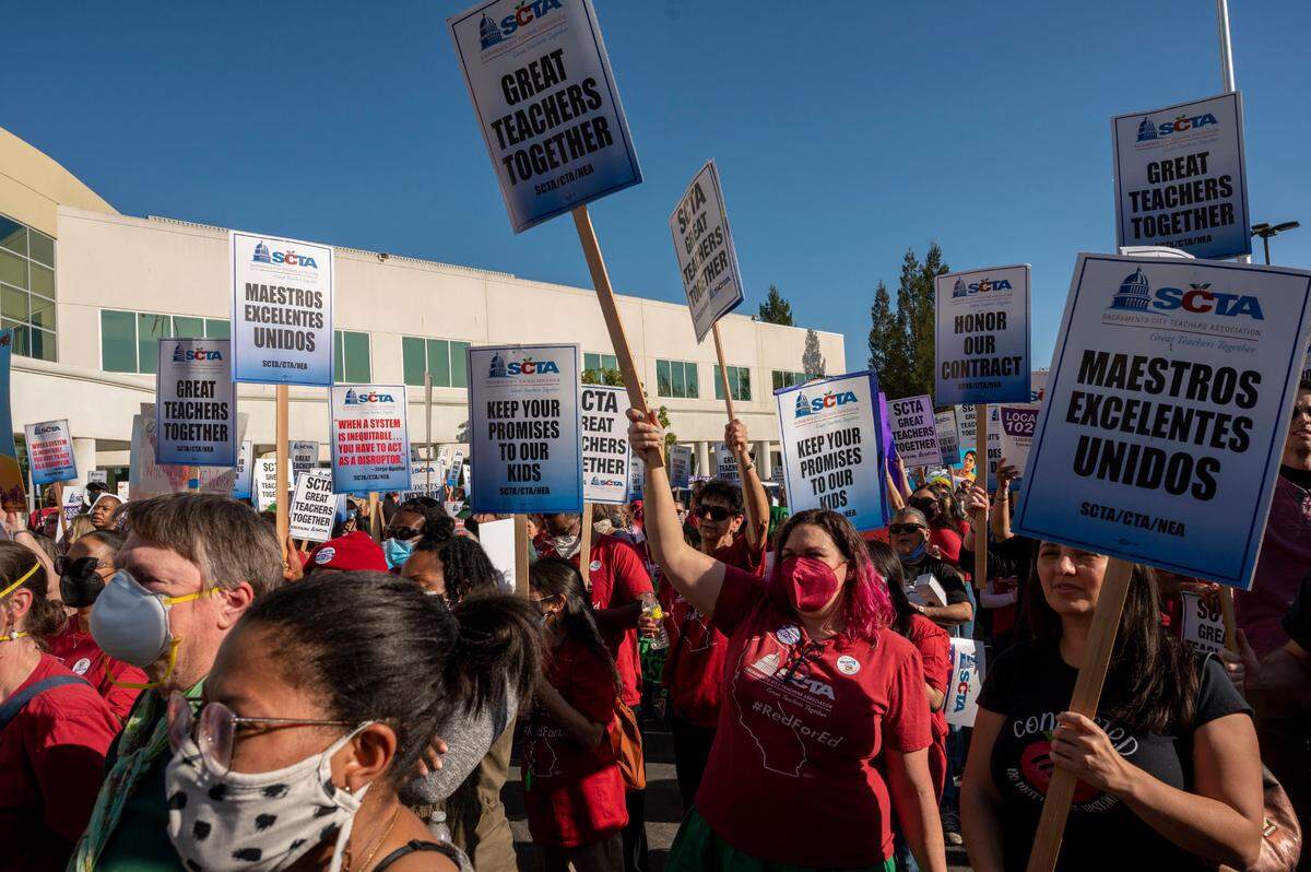 Members of the Sacramento City Teachers Association – the union that represents teachers in the Sacramento City Unified School District – protest in front of the Serna Center on Thursday. They said they if they can’t come to an agreement with the district by next Wednesday, they will strike.