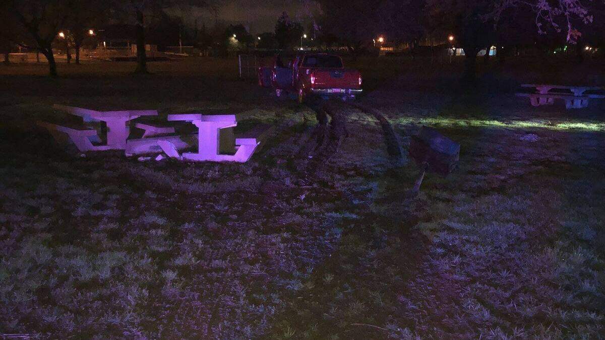 A brief pursuit ended when a stolen vehicle crashed into a bench at McBean Park in Lincoln early Friday, March 29, 2019. Two burglary suspects fled on foot, and one was arrested while the other escaped, police say.