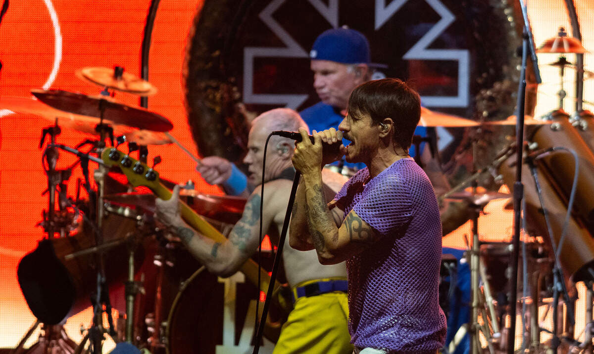 Red Hot Chili Peppers lead singer Anthony Kiedis performs with bassist Flea and drummer Chad Smith at the Toyota Amphitheatre near Wheatland on Sunday, June 2, 2024.