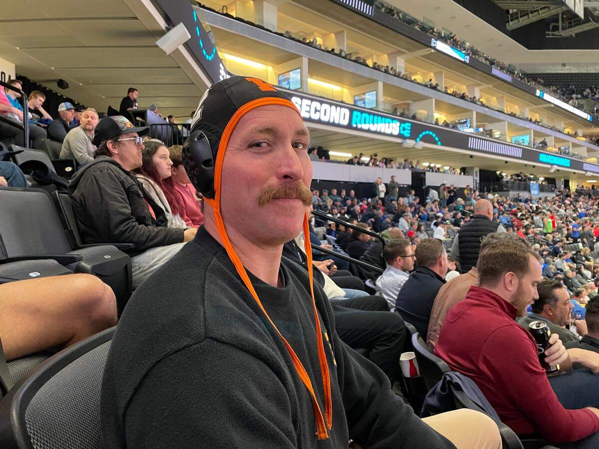 Kevin Foster, a Princeton alum and Davis resident, poses for a portrait while watching Princeton play Arizona in the first round of the men’s NCAA basketball tournament on Thursday, March 16, 2023. Foster rarely took his eyes off the court as the No. 15-seeded Tigers eventually bested the No. 2-seeded Wildcats 59-55.