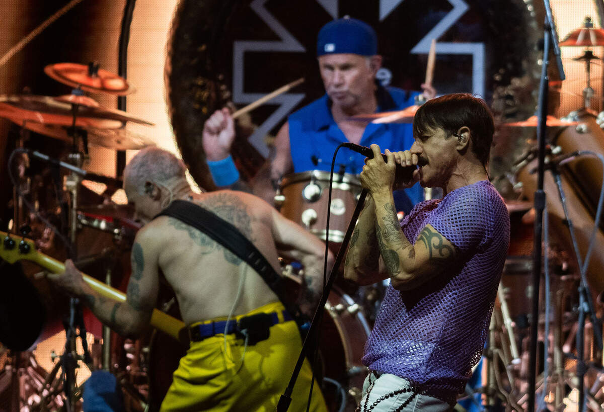 Red Hot Chili Peppers lead singer Anthony Kiedis performs with bassist Flea and drummer Chad Smith at the Toyota Amphitheatre near Wheatland on Sunday, June 2, 2024.