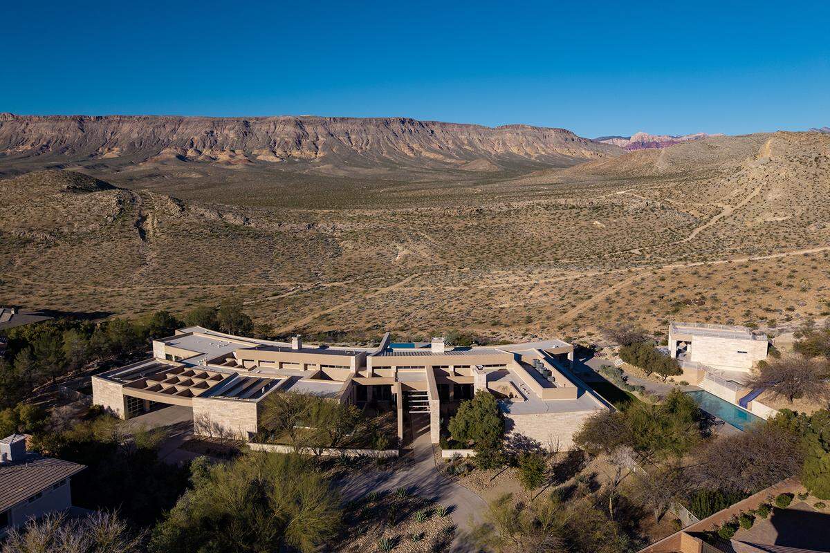 The double-gated, single-story compound in Las Vegas, Nevada, is marketed as a private sanctuary with resort-style pools and sweeping mountain views.