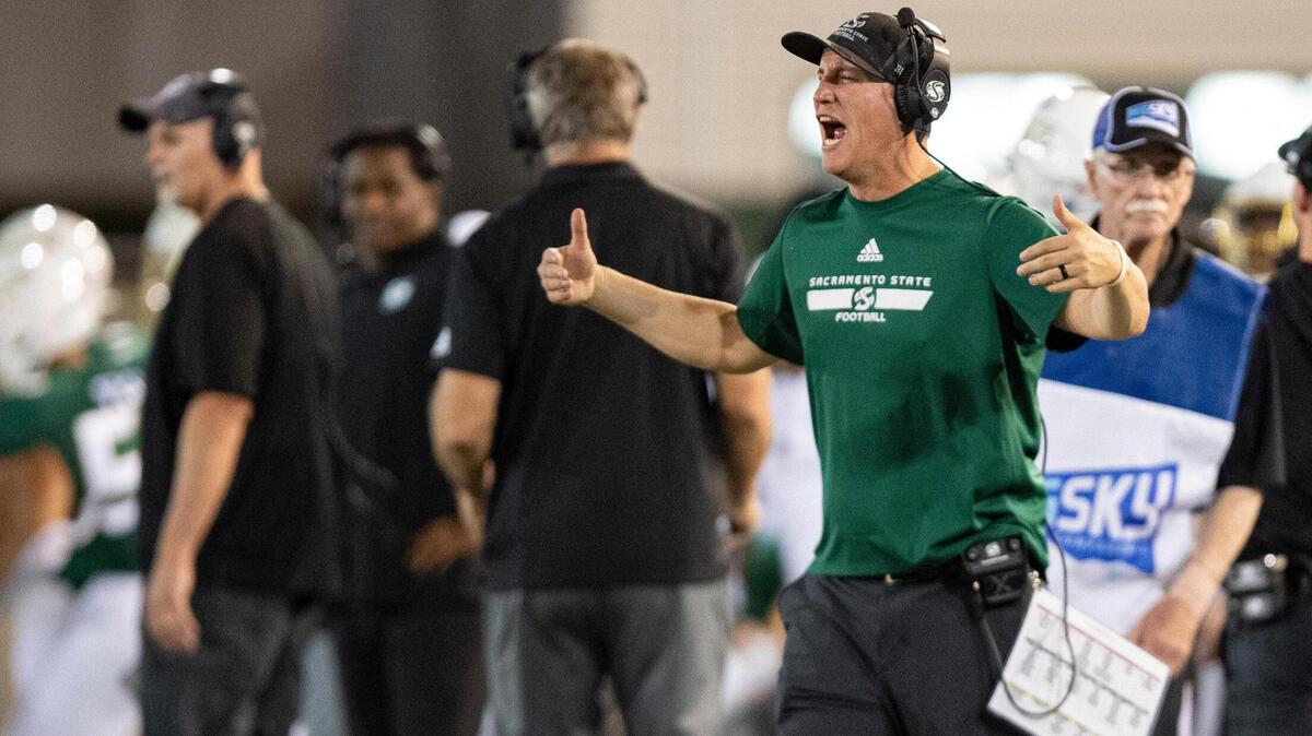 Sacramento State football head coach Andy Thompson shouts to his team from the sideline at Hornet Stadium last week.