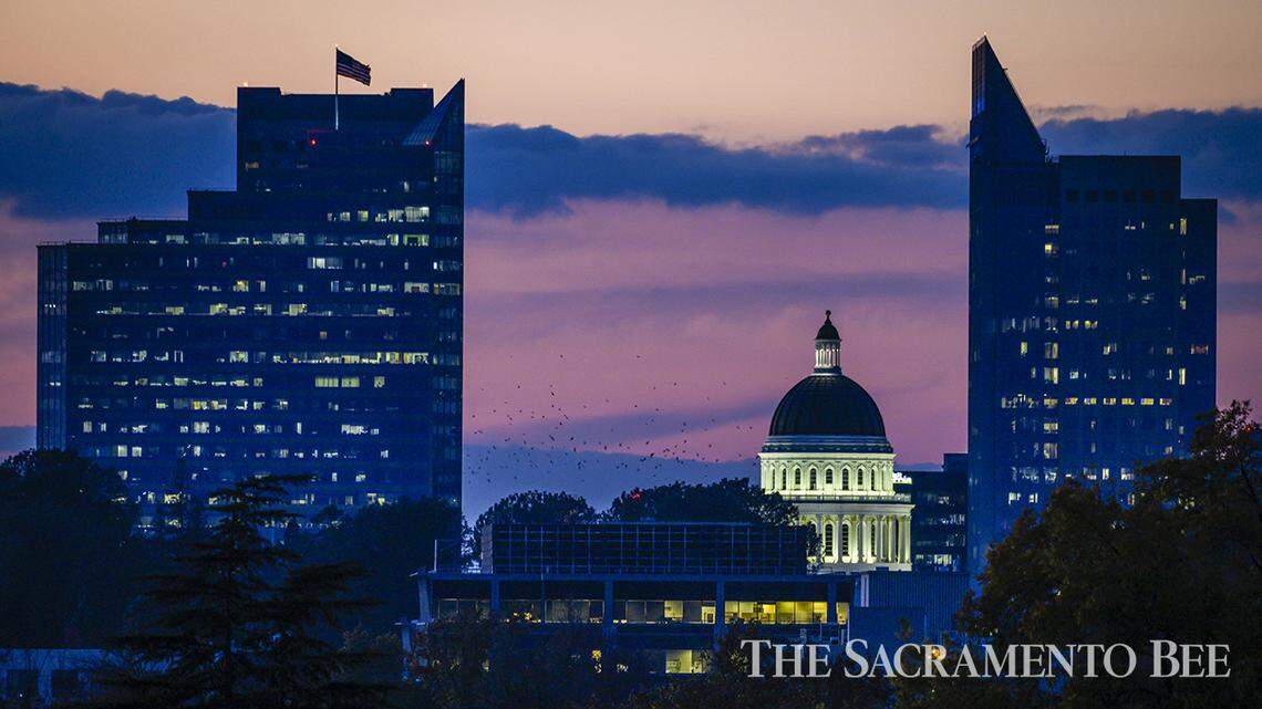 The Capitol dome glows on Thursday, Nov. 14, 2019, after the sunset in downtown Sacramento.