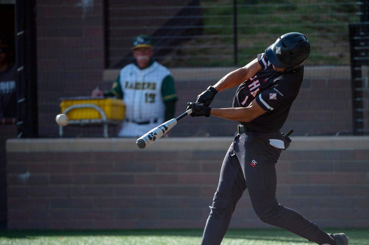 Alpha Charter’s Jaxon Byrd hits an RBI double in the top of the fifth inning against Rio Americano on Thursday at Jesuit High School in Carmichael. Byrd had four at-bats with two hits and an RBI.