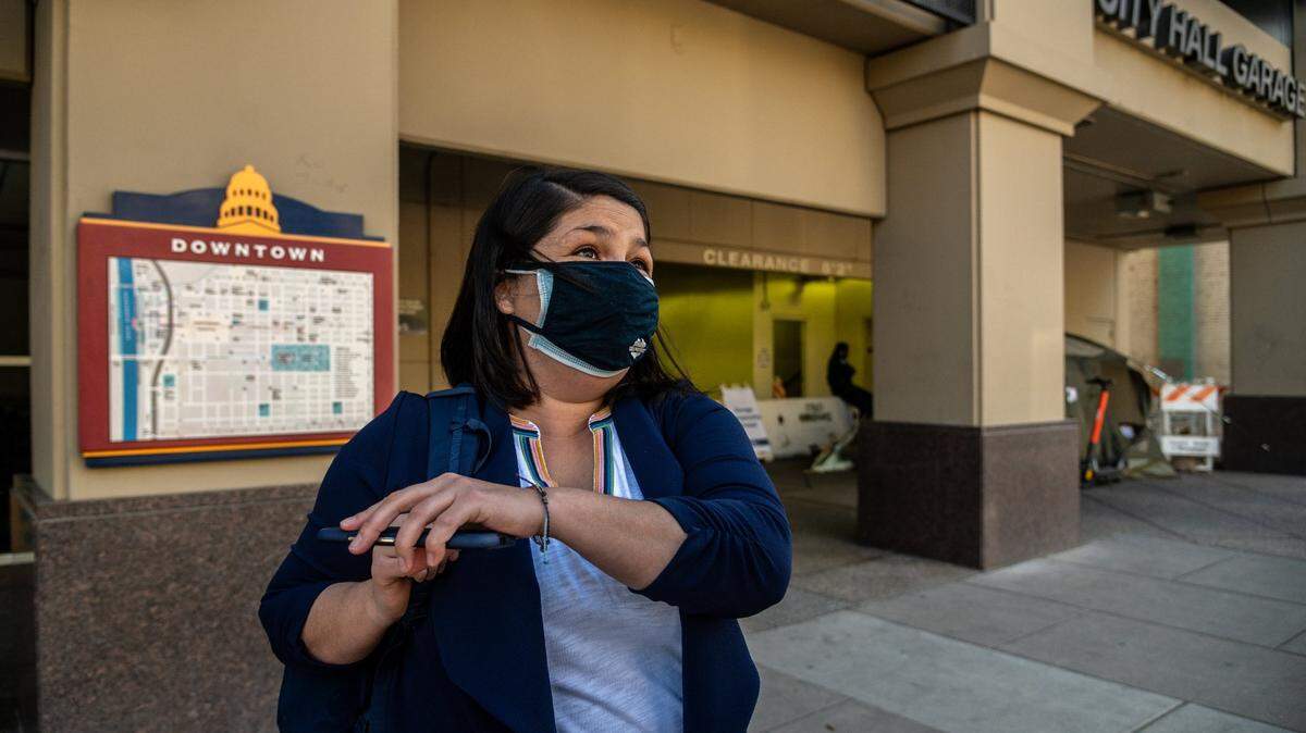Sacramento Councilwoman Katie Valenzuela reacts to the structure damage at City Hall Garage from a van fire that was allowed safe parking for homeless by the city on Friday, March 26, 2021. Valenzuela has hired podcast host Skyler Henry, who said earlier this year elected officials should be “terrified for the rest of” their lives after making certain decisions.
