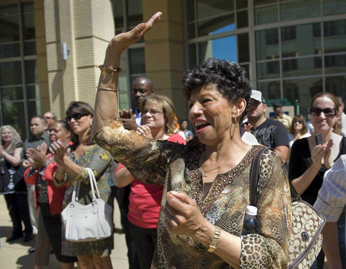 Georgia West cheers as Mayor Kevin Johnson announces that the Sacramento Kings will stay in Sacramento during a news conference at City Hall in 2011. Georgia Rose Peat West died peacefully Monday, Dec. 23, 2024, at her Oak Park home with her sons, former Sacramento Mayor Kevin Johnson and marketing executive Ronnie West, beside her.