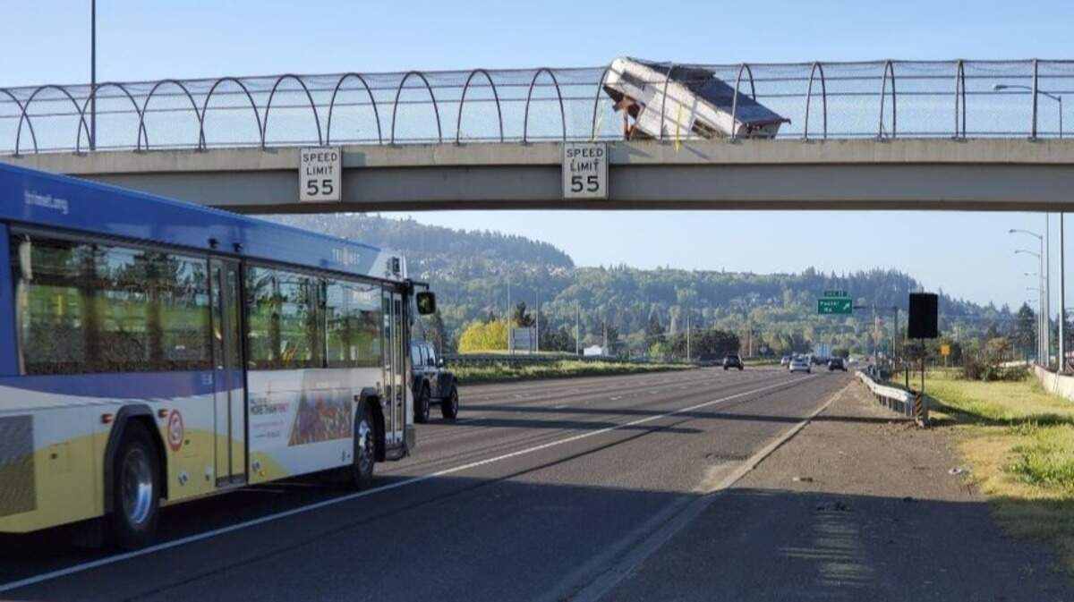 Police in Portland, Oregon, posted photos to Twitter of a camper found partway across a highway overpass for bicycles and pedestrians only. “Shaking our heads,” police wrote.