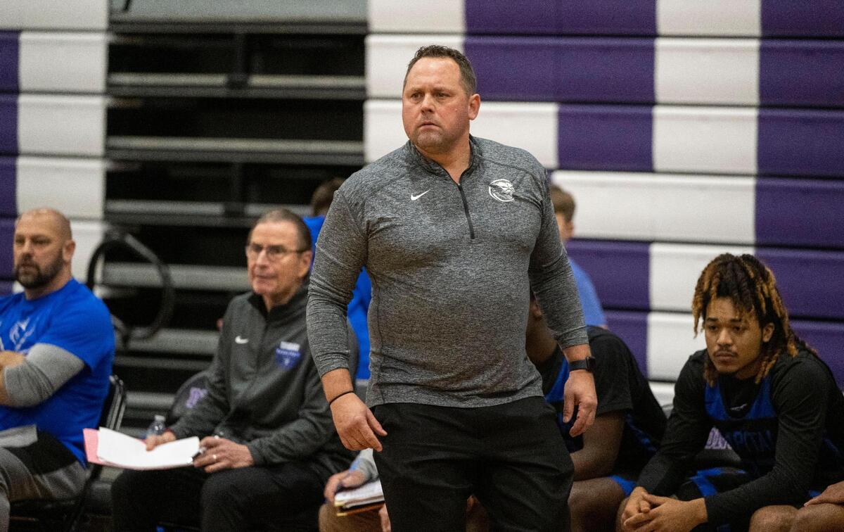 Capital Christian High School boys basketball coach Michael Lorente watches the action as the Sacramento Dragons host the Cougars in January.