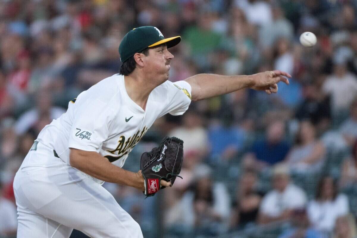 Athletics starting pitcher Jacob Lopez throws against the Philadelphia Phillies during a game at Sutter Health Park on Friday in West Sacramento.