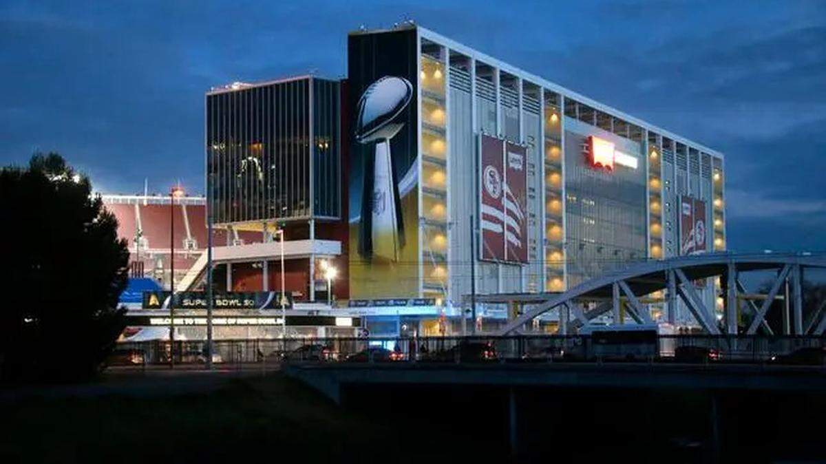 Levi’s Stadium is decorated with a large mural of the Lombardi Trophy on Monday, Jan. 11, 2016, in Santa Clara ahead of Super Bowl 50. The stadium will host Super Bowl LX.