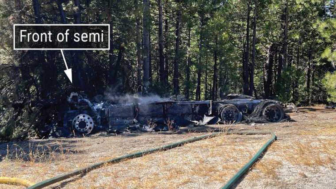 A photo provided in a preliminary report by the National Transportation Safety Board shows the hulking remains of a Tesla Semi after it crashed and caught fire on Interstate 80 in Placer County. The Aug. 19 crash ignited the vehicle’s batteries, closing the freeway for hours.