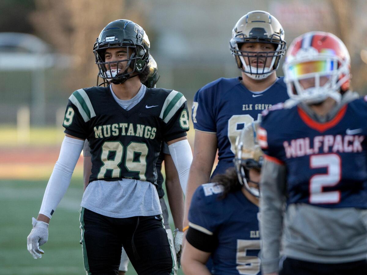 Monterey Trail Mustangs star tight end Fatu Puloka laughs during practice for the 63rd Optimist All-Star Football Classic at Hughes Stadium in Sacramento, Tuesday, Jan. 17, 2023. Puloka is headed to Sacramento State on football scholarship.